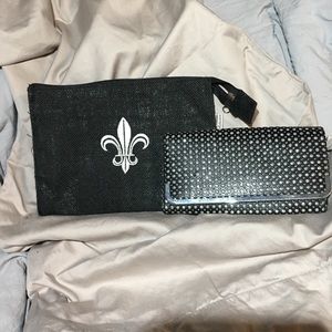 Studded wallet with Fleur-de-lis bag.